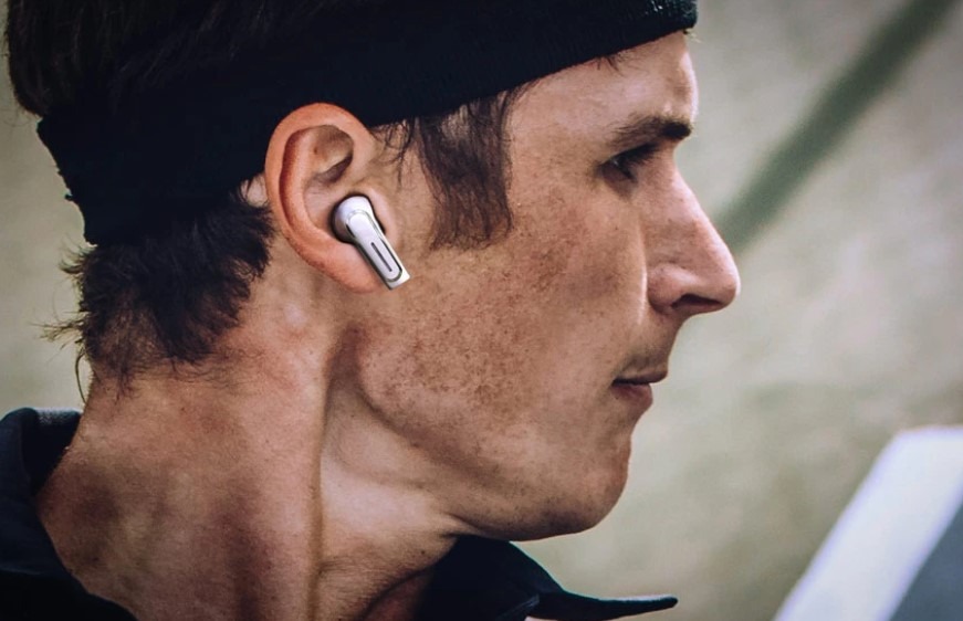 man with ear buds