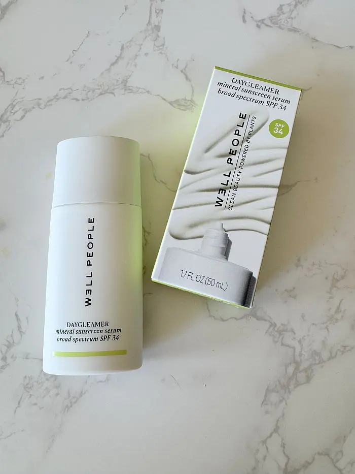 Daygleamer Mineral Sunscreen Serum SPF 34 by Well People, bottle and box