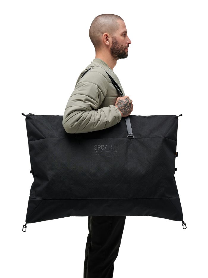 Man holding SPC/LST System Duffel